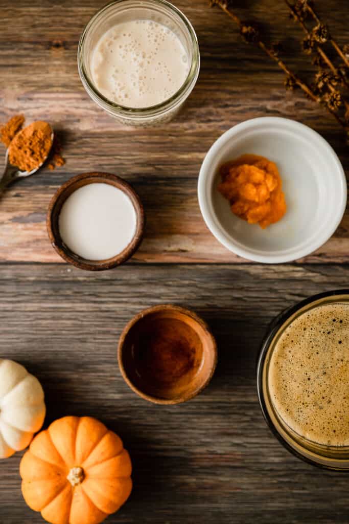 An overhead shot of the ingredients needed for a paleo pumpkin spice latte
